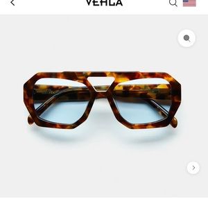 Vehla River sunglasses. Blue lenses.